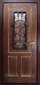 Фото  Стальная дверь Дверь с ковкой №20 с отделкой Массив дуба
